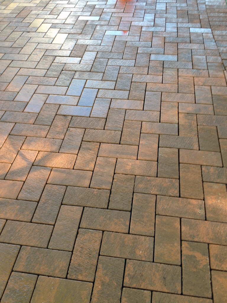 light terra cotta bricks in a chevron pattern 