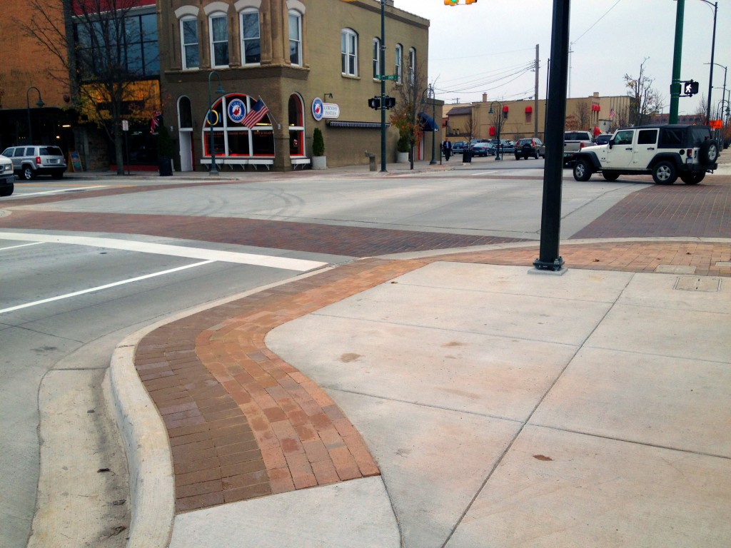 brick sidewalk corner at W. State and S. Union street
