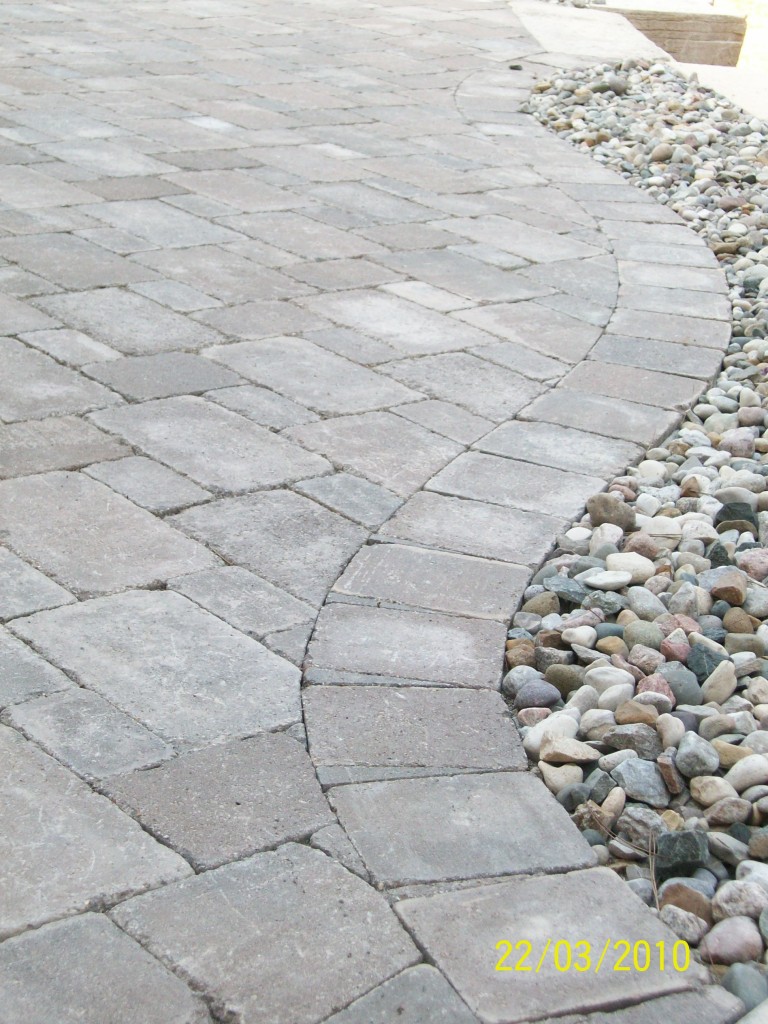 paver walkway with small rock accents