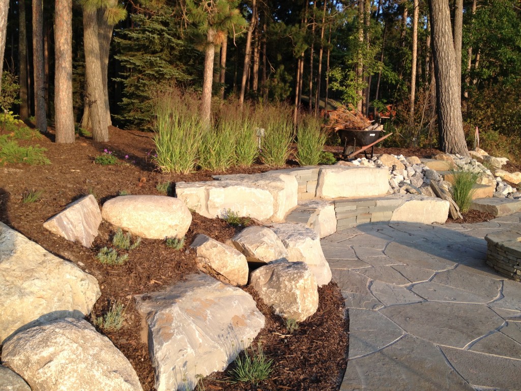 large stones and mulch in landscape design