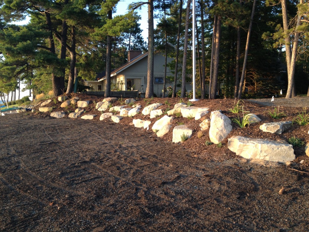 stone and mulch barrier