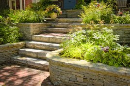 retaining wall with large stone steps