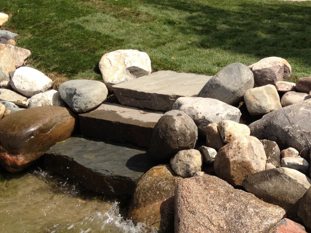 flat stone stairway down into the water