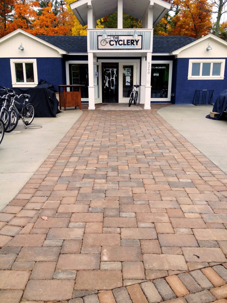 brick sidewalk outside of the cyclery