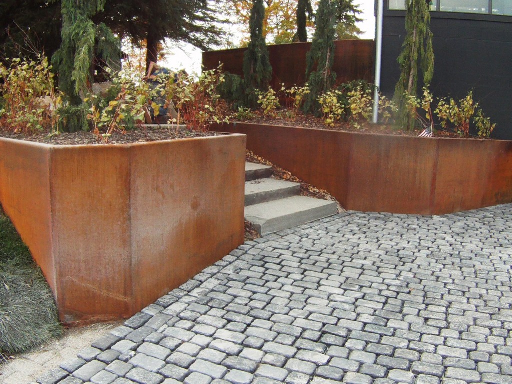 decorative shrubs on retaining wall garden