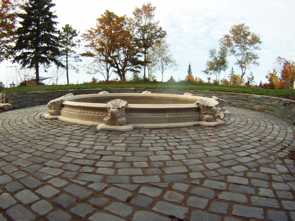 pavers encircling decorative fountain