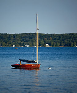 moored sailboat on crystal lake