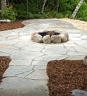 stone path leading to outdoor fire pit