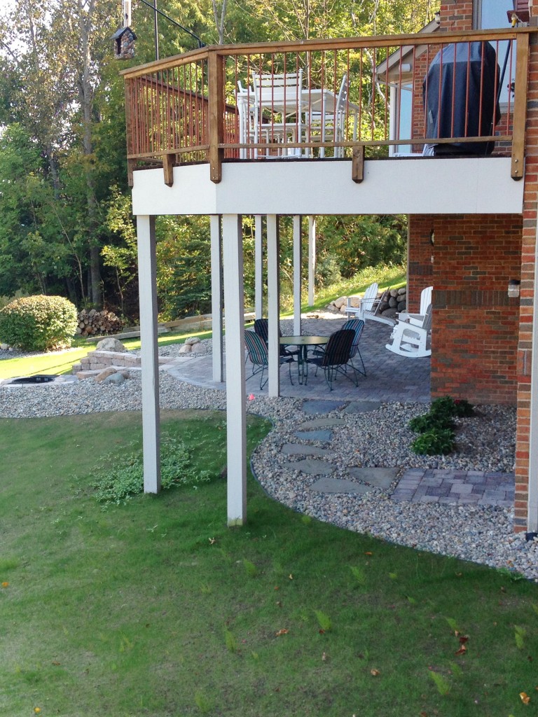 landscaped area with small rocks under deck