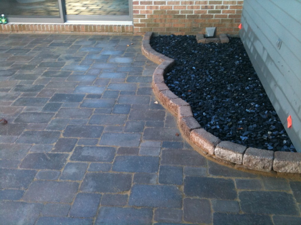 decorative rock garden adjacent to sliding door