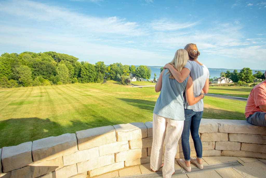 two women admiring a freshly cut lawn