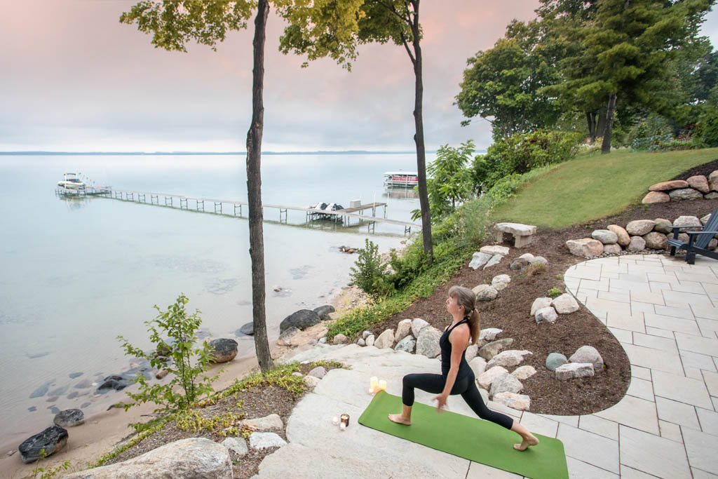 woman stretching looking out at the bay