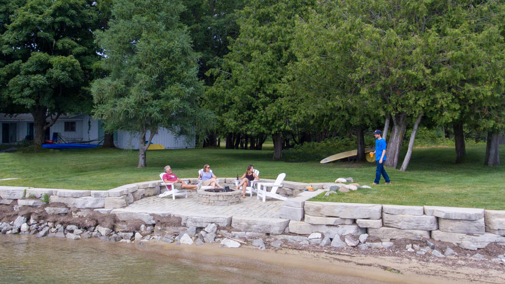 view of family enjoying an evening on the waterfront